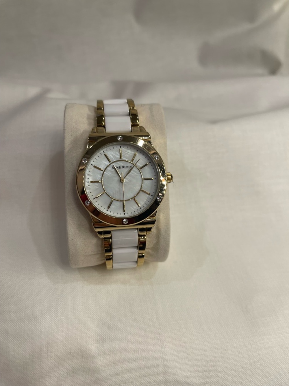 Anne Klein Gold and White Ceramic Bracelet Watch with Crystal Accents
